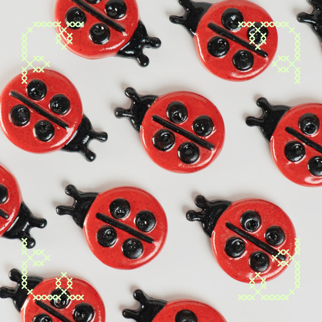 ladybug button worry stone - oopsie