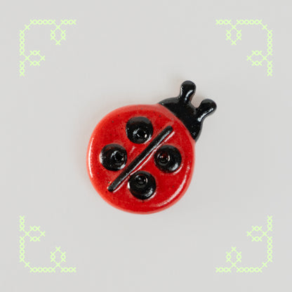 ladybug button worry stone - oopsie