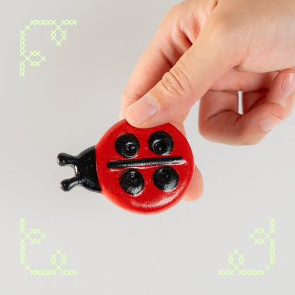 ladybug button worry stone - oopsie