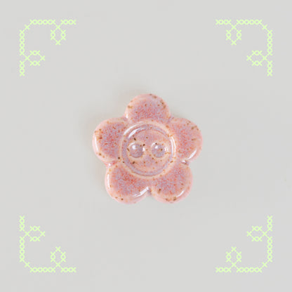 flower button worry stone