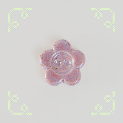 flower button worry stone